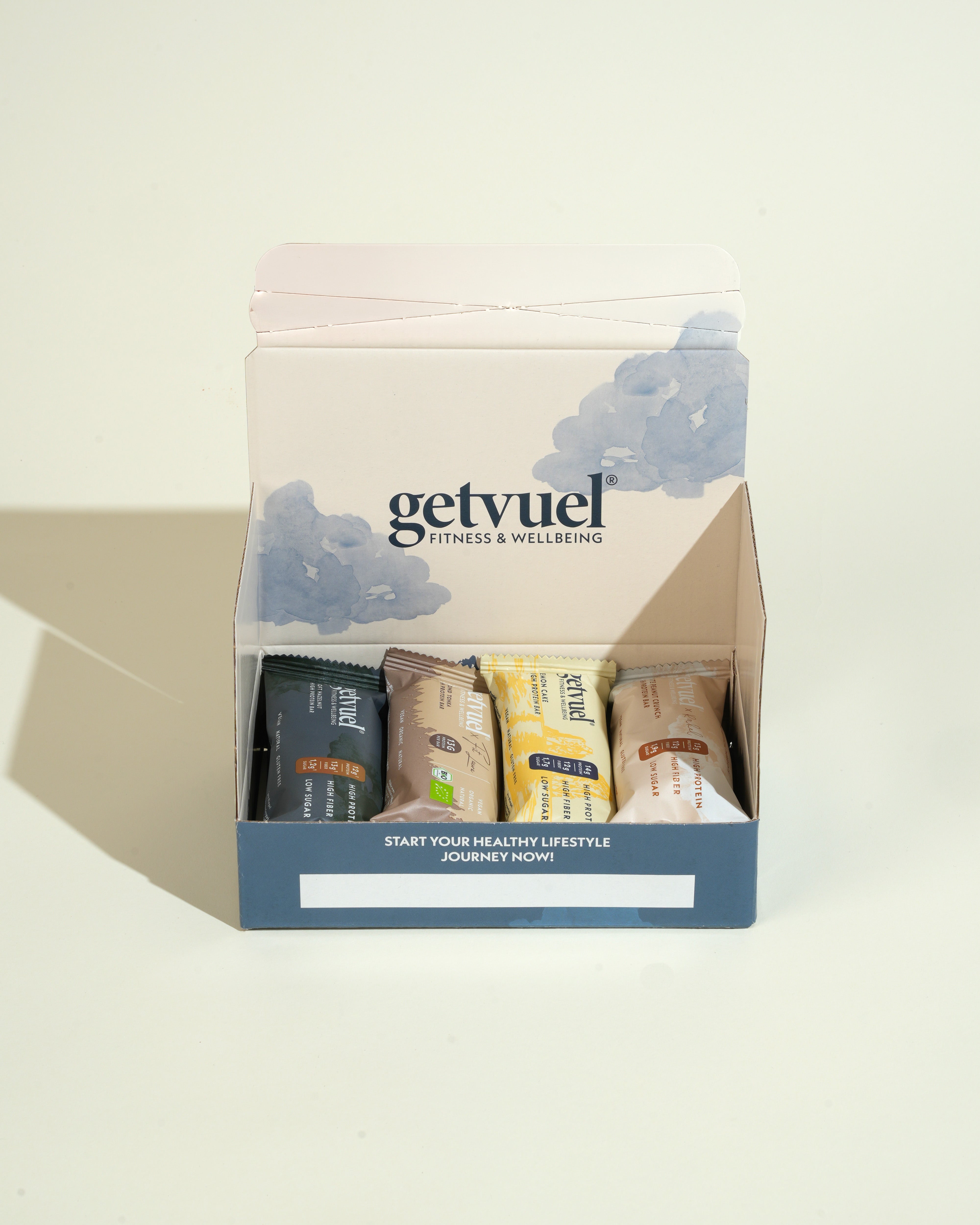 Proteinriegel von getvuel – Probierbox mit vier Sorten – Packansicht